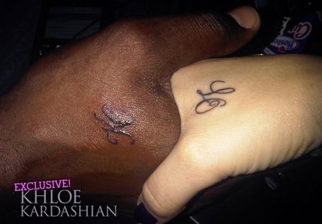 Michael Clarke got a tattoo with Laura BIngle's initials in it.