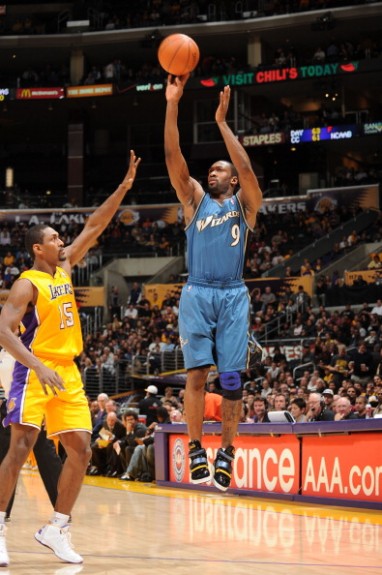 Gilbert Arenas Dons High Fashion Sneakers On The Court