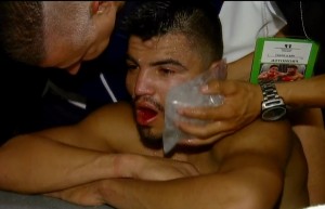 Victor Ortiz quits in 9th round due to broken jaw against Josesito Lopez [video]