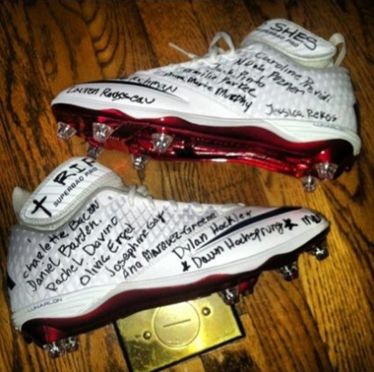 chris-johnsons-cleats-pay-tribute-to-newtown-victims