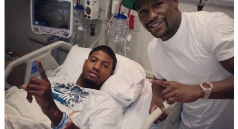 Floyd Mayweather Jr. Visits Paul George In Hospital [Photo]