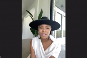 LeToya Luckett sitting on couch with hat