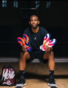 Chris Paul posing with Move Insoles