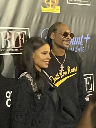 Snoop Dogg and Sanaa Lathan at screening